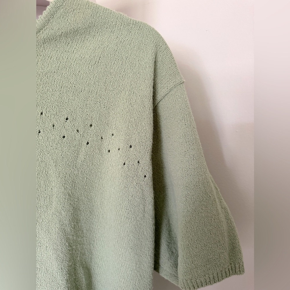 Adorable knitted green shirt giving serious Cottagecore vibes